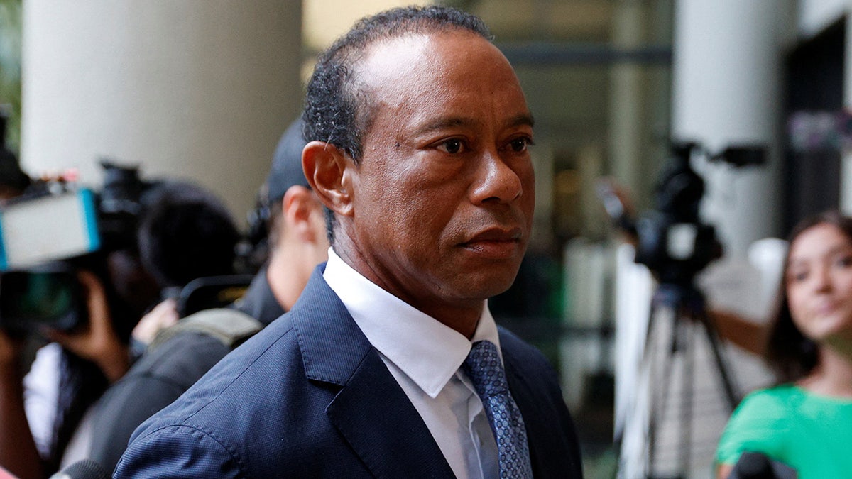 Golfer Tiger Woods walks outside the courthouse where he is scheduled to appear before a judge in person for the first time since his March 27 car accident, when he was arrested on a misdemeanor driving under the influence (DUI) charge after a rollover crash, in Stuart, Florida, U.S., September 2, 2026. REUTERS/Marco Bello