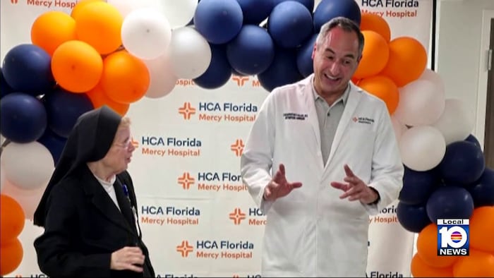 Orthopedic surgeon suffers spinal injury after driver struck him while cycling on Rickenbacker Causeway in Miami