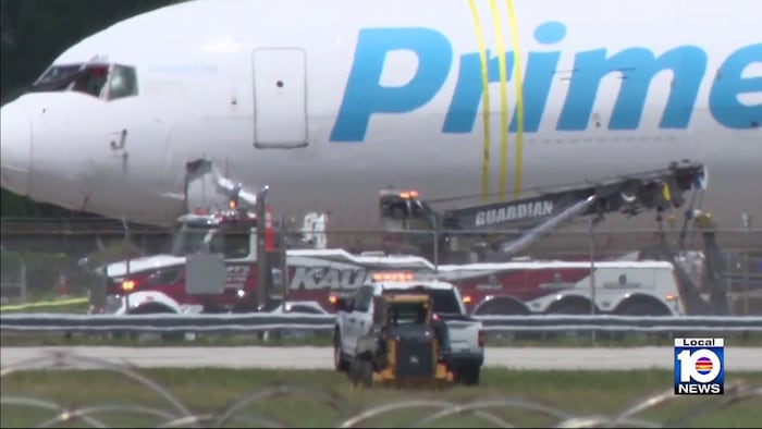 Feds move Boeing 767-300 cargo jet from fatal crash site to lot near Miami International Airport