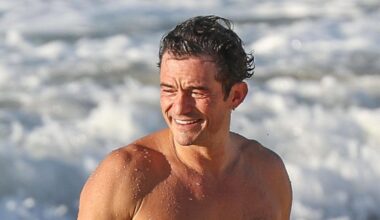 Shirtless Orlando Bloom is ripped in James Bond-worthy beach appearance