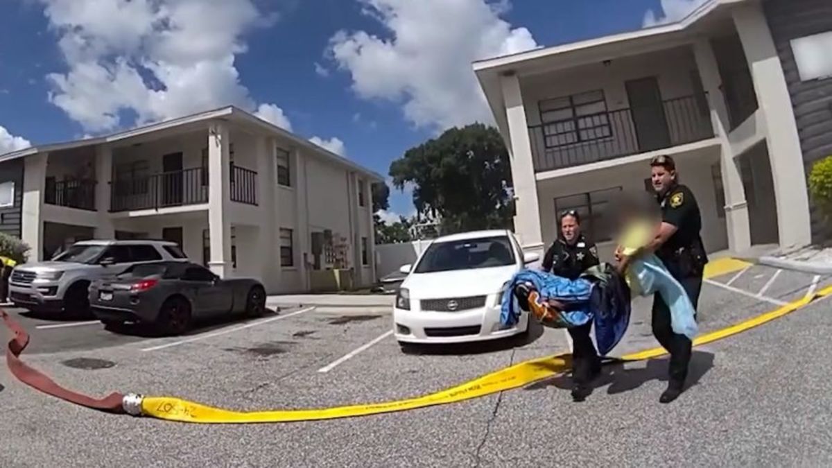 Deputies carry bed-bound resident out of burning St. Pete apartment