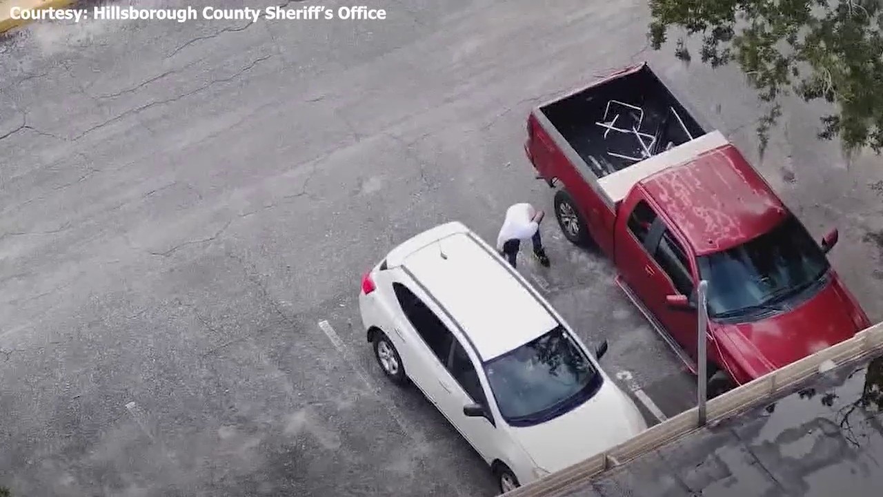 Tampa man caught on camera slashing car tire