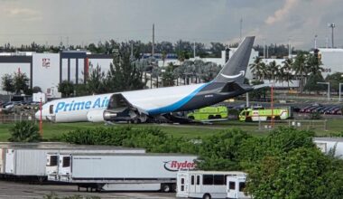 An Amazon cargo plane sits at the Miami International Airport after it overshot the runway Sunday, Sept. 6, 2026. (AP Photo/David Fischer)