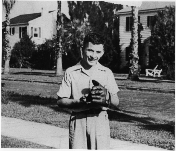 Astronaut John Watts Young, with his baseball glove, is seen in junior high school in Orlando in this undated file photo from the 1940s. He graduated from Orlando High School in 1948. (Sentinel file)