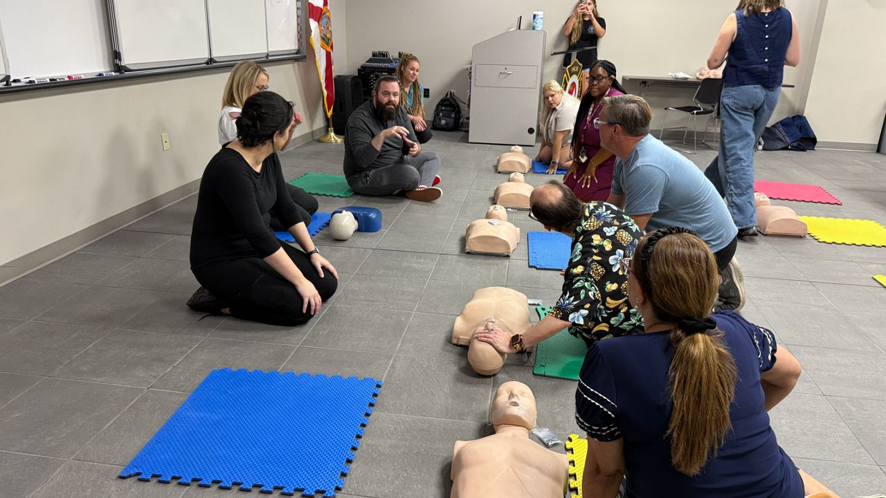 This was the second CPR class Palm Harbor Fire Rescue organized for people with different hearing abilities. About a dozen people attended on Sept. 25, 2026. (Spectrum News/Tyler O'Neill)