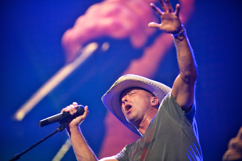 Kenny Chesney performing live on stage at the inaugural iHeartRadio Music Festival held at the MGM Grand Garden Arena in Las Vegas, Nevada.