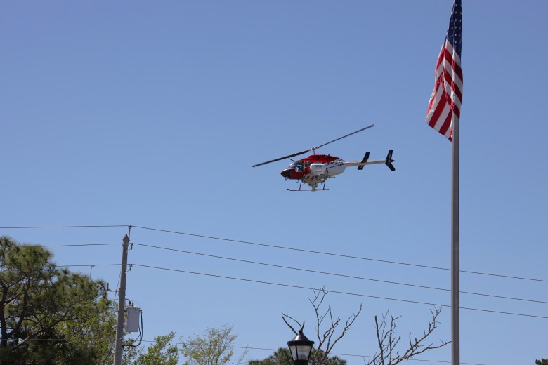 Mosquito Control Helicopter Flying Over Wetlands in Tampa, Florida