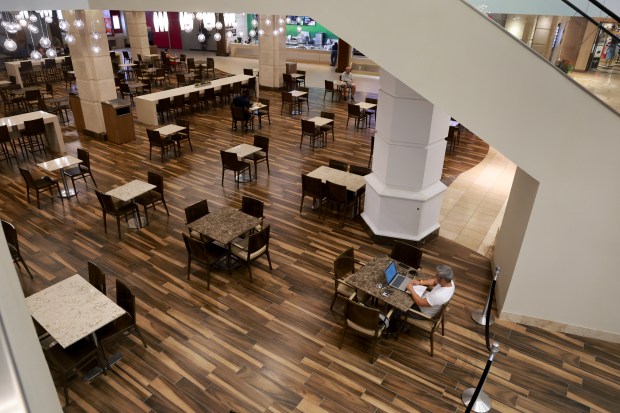 On a rainy Friday afternoon, shoppers can be seen at the nearly empty Galleria mall in Fort Lauderdale. (Mike Stocker/South Florida Sun Sentinel) 