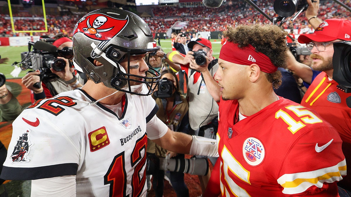 Tom Brady greets Patrick Mahomes