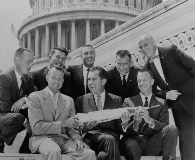 Vice President Richard Nixon poses on the Capitol steps in Washington with the Mercury 7 astronauts in 1959. (New York Daily News file)