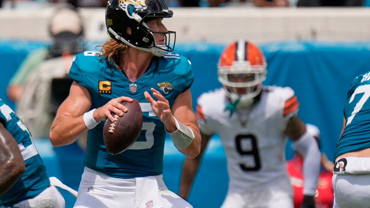 Jacksonville Jaguars quarterback Trevor Lawrence (16) passes in the first half of an NFL football game, Sunday, Sept. 13, 2026, in Jacksonville. (AP Photo/Mike Stewart)