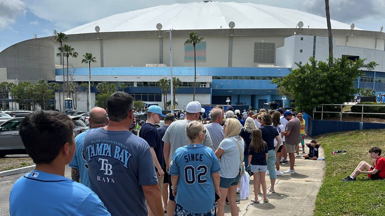 Fans wait outside Tropicana Field before the Rays home opener on April 6, 2026. (Spectrum News/Anthony Sande)