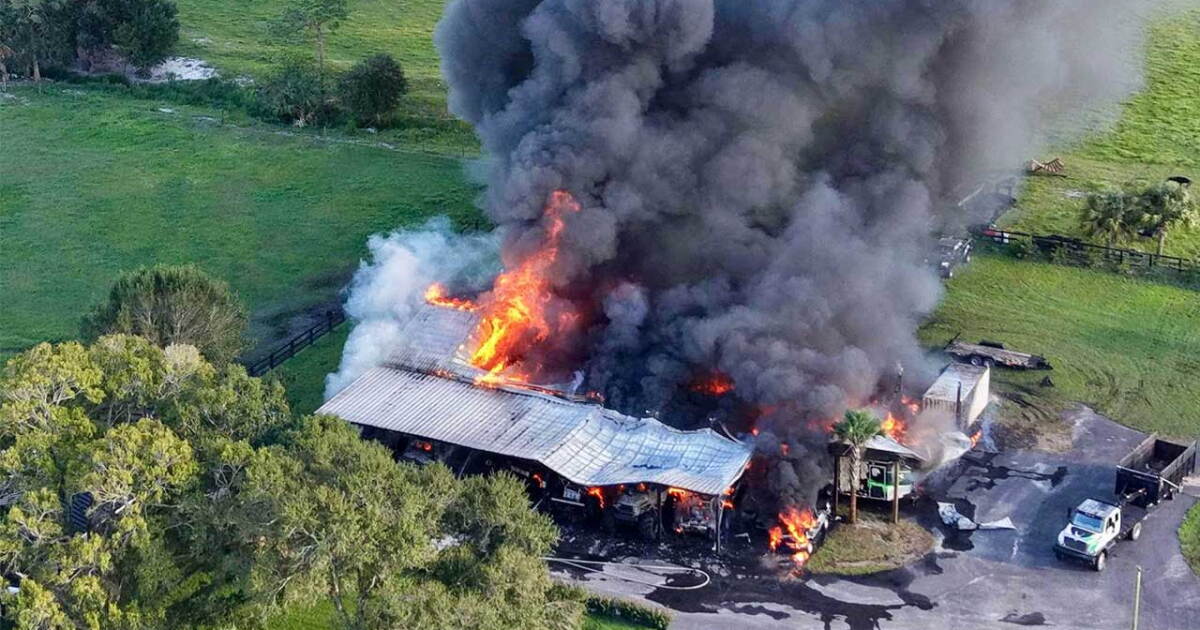 Large barn fire destroys building, 6 vehicles