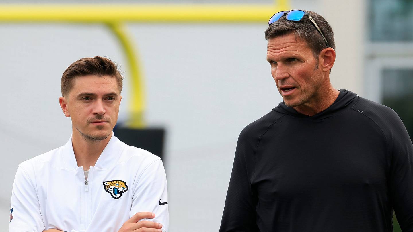 Jacksonville Jaguars general manager James Gladstone, left, and Executive Vice President of football operations Tony Boselli talk during the first day of NFL Training Camp at the Miller Electric Center on Wednesday, July 29, 2026, in Jacksonville, Fla.