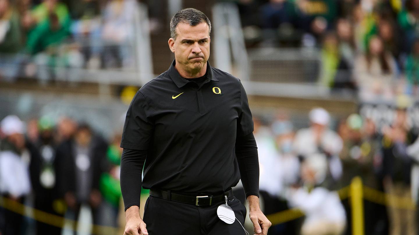 Nov 27, 2021; Eugene, Oregon, USA; Oregon Ducks head coach Mario Cristobal walks the field before a game against the Oregon State Beavers at Autzen Stadium. Mandatory Credit: Troy Wayrynen-USA TODAY Sports