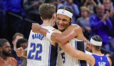 Dec 29, 2023; Orlando, Florida, USA; Orlando Magic forward Franz Wagner (22) and forward Paolo Banchero (5) celebrate their 117-108 win against the New York Knicks at KIA Center. Mandatory Credit: Mike Watters-USA TODAY Sports