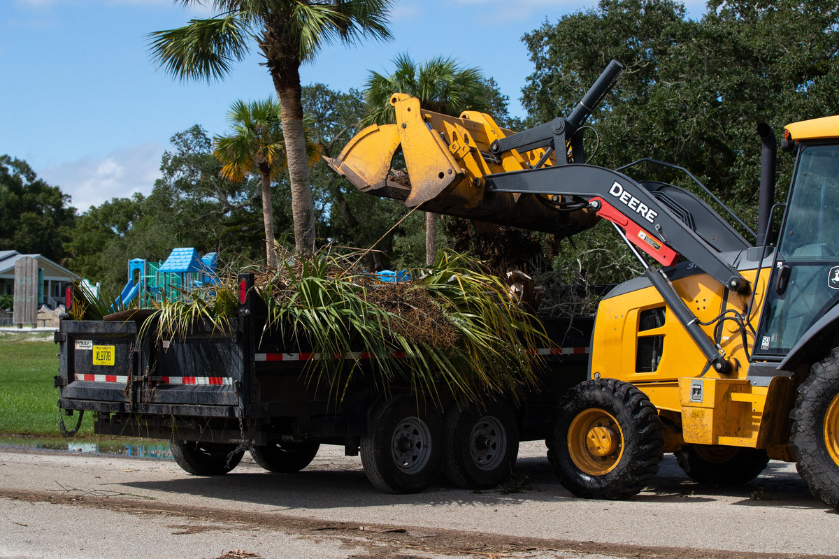 City of Apalachicola Public Works staff operate heavy equipment during recovery efforts in Apalachicola, Saturday, Oct. 10, 2026.