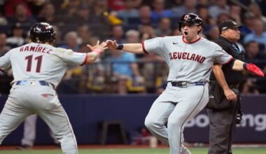 Cleveland Guardians' José Ramírez and Chase DeLauter celebrate after scoring on a single by Nathaniel Lowe against the Tampa Bay Rays during the eighth inning in Game 1 of an American League Championship Series baseball game in St. Petersburg, Fla. Monday, Oct. 12, 2026. (AP Photo/David J. Phillip)