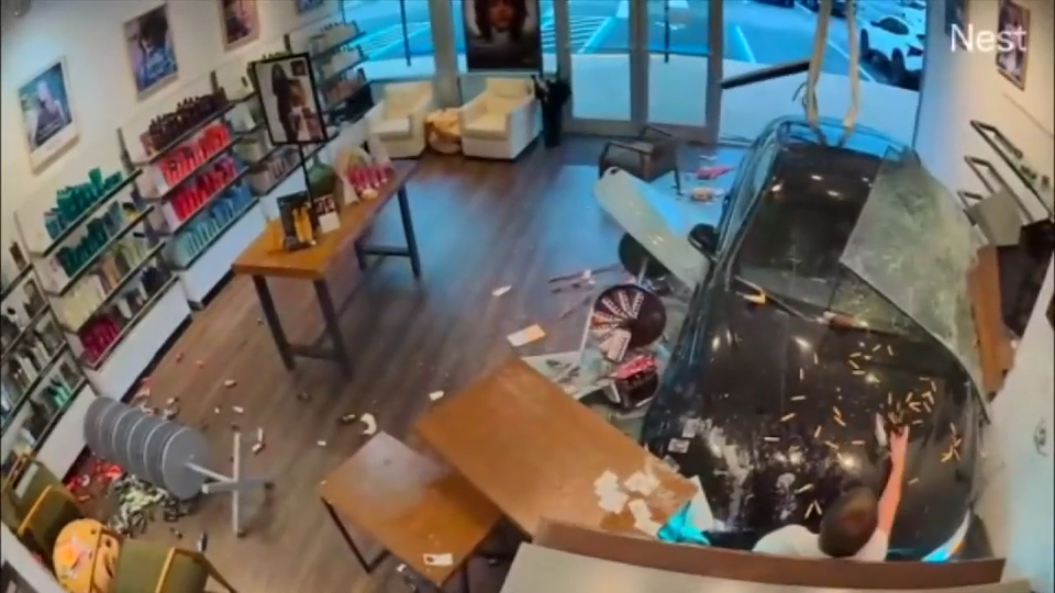 Surveillance video captures BMW crashing into Jacksonville salon, pinning 2 customers, employee - WSVN 7News | Miami News, Weather, Sports