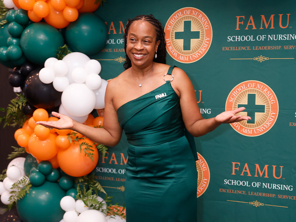 FAMU National Alumni Association President Artisia Polk shows her Rattler pride during the FAMU School of Nursing’s 90th anniversary commemorative gala at the AC Hotel Tallahassee. (Photo Courtesy: Steve Byrum)