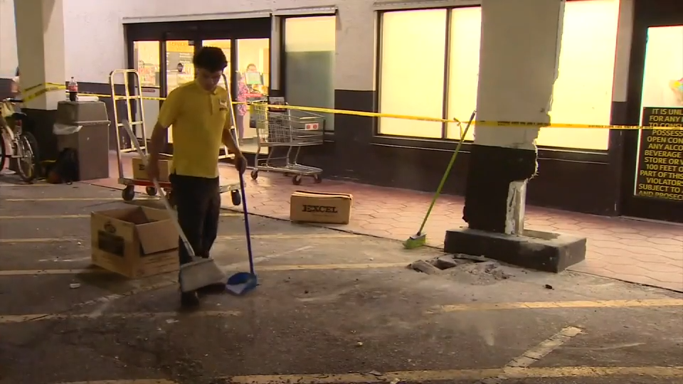 Employees clean up debris after Hialeah store left with damage following unknown incident - WSVN 7News | Miami News, Weather, Sports