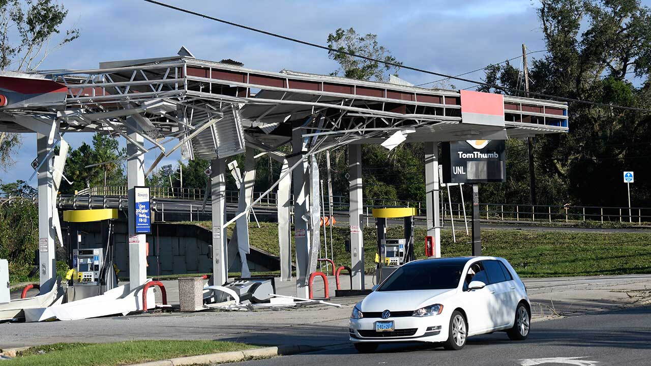 A gas station is damaged by the effects of Isaias on Saturday, Oct. 10, 2026, in East Milton, Fla.