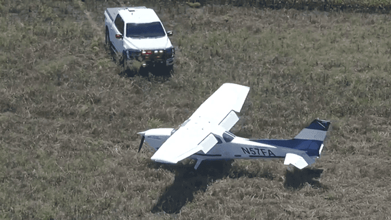 A small plane made an emergency landing in a field near Miami Executive Airport. No injuries were reported. (CBS Miami)