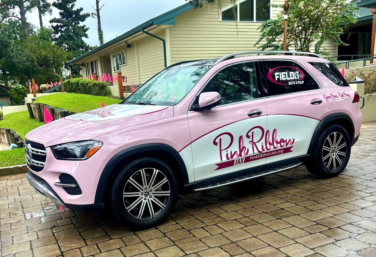 The Pink Ribbon Jax car was on site for photos despite the rain.