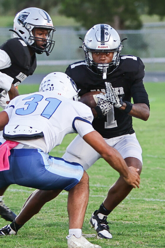 PHOTO GALLERY | Oasis Sharks vs Mariner Tritons football