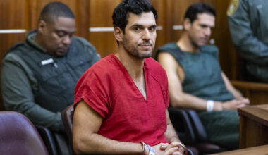 Oren Alexander, 37, center, and his twin brother, Alon, right, attend their bond hearing at the Richard E. Gerstein Justice Building on December 13, 2024 in Miami, Florida. The Alexanders have been charged with multiple state and federal crimes, including sex trafficking and rape.