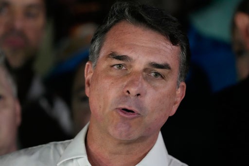 Defeated presidential candidate Flávio Bolsonaro and his family land in Miami after fleeing Brazil