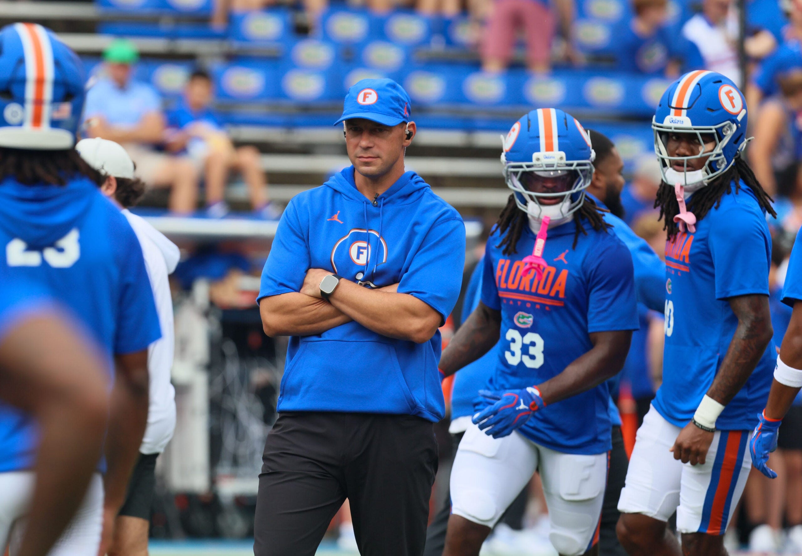 Florida head coach Jon Sumrall watches warm up before taking on South Carolina before an NCAA football at Steve Spurrier Field at Ben Hill Griffin Stadium in Gainesville, FL on Saturday, October 10, 2026.