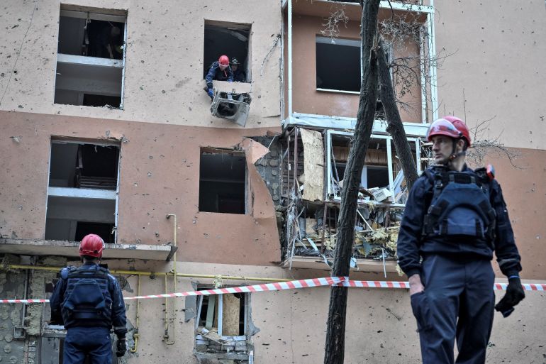 Rescuers work at the site an apartment building damaged during a Russian air strike in Zaporizhzhia, Ukraine, on October 17, 2026 [Reuters]