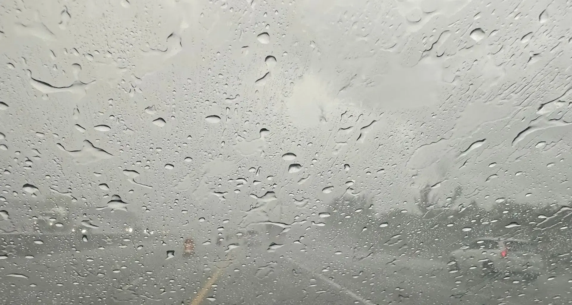 Periods of heavy rain can obstruct visibility on the road and make driving dangerous.