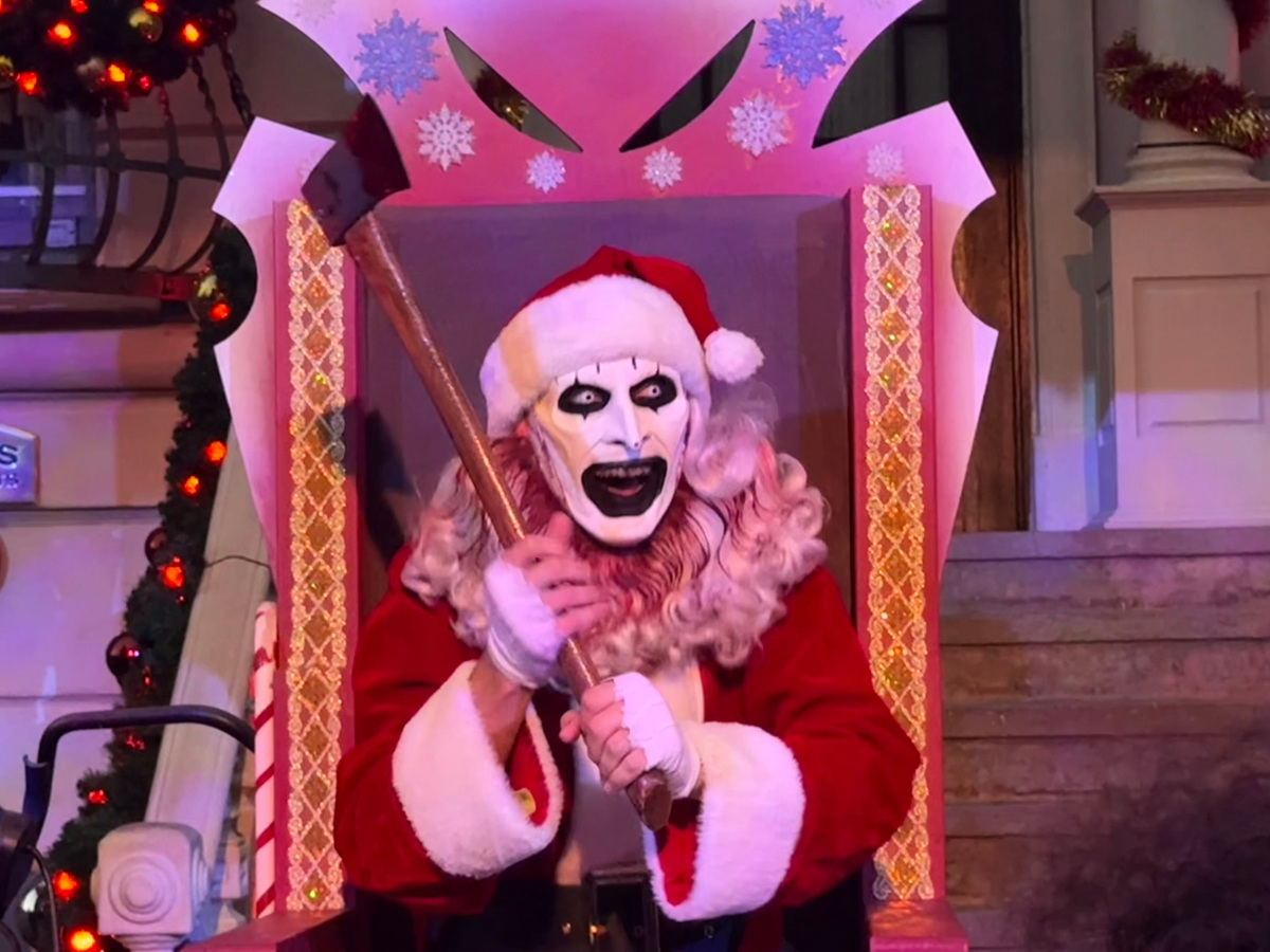 Art the Clown makes appearances on a side street in the New York area during Universal Orlando's Halloween Horror Nights.