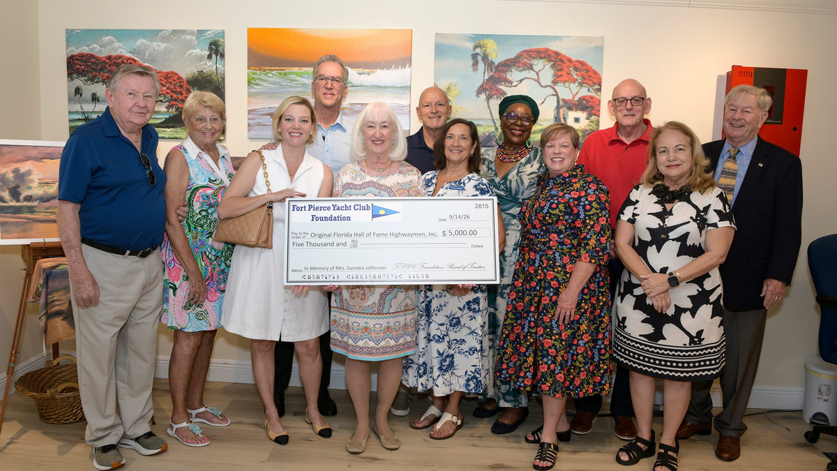 Members of the Fort Pierce Yacht Club present a check for $5,000 to name a gallery after Zanobia Jefferson. Members of the Fort Pierce Yacht Club present a check for $5,000 to name a gallery after Zanobia Jefferson.
