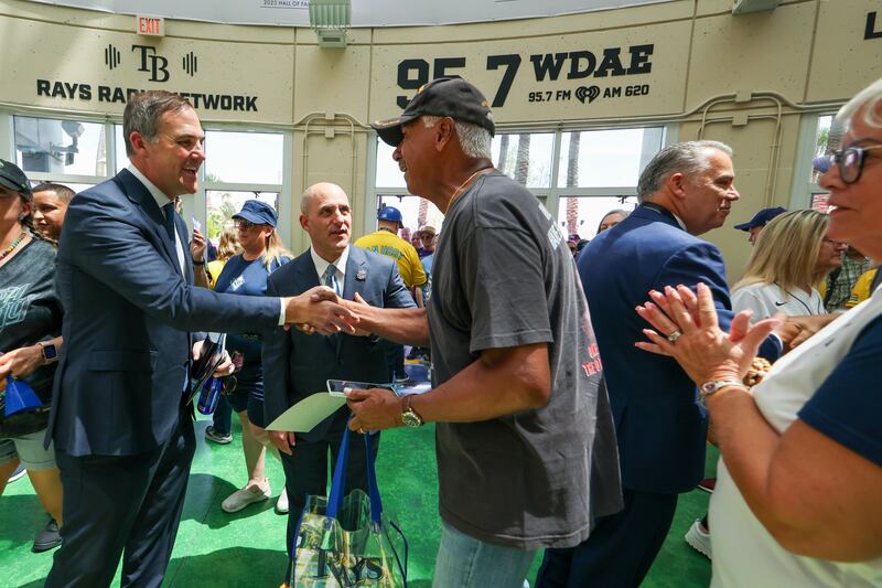 ST. PETERSBURG, FL - APRIL 06: Owner Patrick Zalupski and Chief Executive Officer Ken Babby of the Tampa Bay Rays greet fans in the Rotunda prior to the game between the Chicago Cubs and the Tampa Bay Rays at Tropicana Field on Monday, April 6, 2026 in St. Petersburg, Florida. (Photo by Mike Carlson/MLB Photos via Getty Images)
