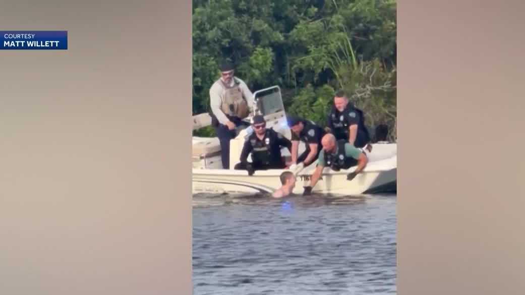 Naked man pulled from Florida canal to face charges, police say