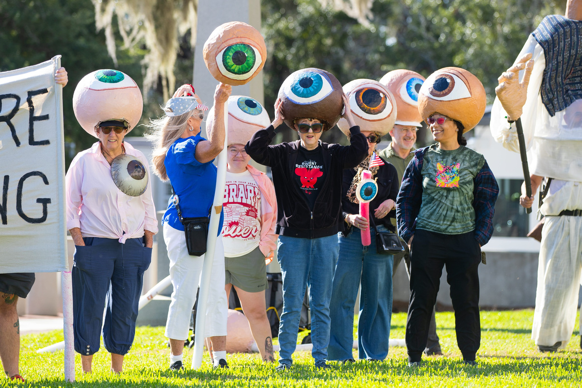 The "Eyeball Brigade," created and organized by Doug Schrock, attends the "No Kings Tallahassee: Our Voice, Our Vote" rally in front of the Florida State Capitol in Tallahassee, Florida on Saturday, Oct. 17, 2026.