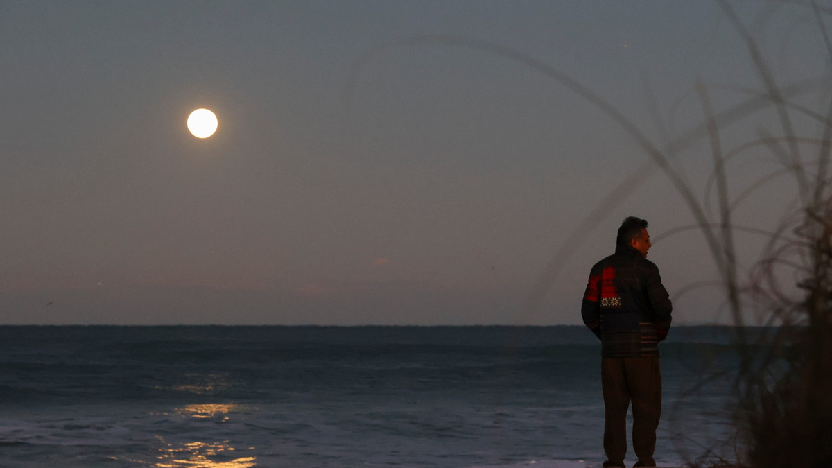 A full moon, also known as the Snow Moon, rises over the Atlantic Ocean on Feb. 1, 2026, at Jensen Beach Park. February's moon is known as the Snow Moon because it occurs around the time of peak snowfall, according to the Old Farmer's Almanac. Daily low temperature records were broken across the three-county Treasure Coast region in the early morning hours of Feb. 1, according to the National Weather Service office in Melbourne.