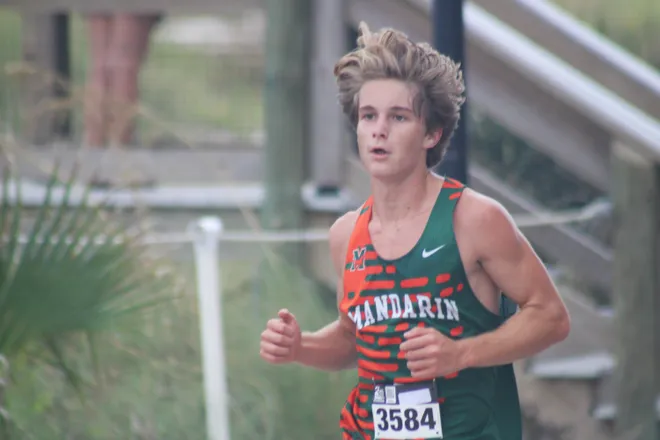 Mandarin's Dillon Graves (3584) races to victory during the Nor'Eastern Classic high school cross country meet on Sept. 29, 2026 in Jacksonville Beach, Florida. [Clayton Freeman/Florida Times-Union]