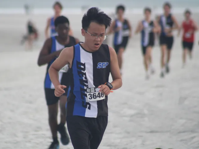 Stanton's Anson Chen (3646) runs in the boys race during the Nor'Eastern Classic high school cross country meet on Sept. 29, 2026 in Jacksonville Beach, Florida. [Clayton Freeman/Florida Times-Union]