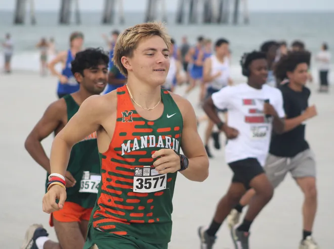 Mandarin's Evan Camden (3577) runs in the boys race during the Nor'Eastern Classic high school cross country meet on Sept. 29, 2026 in Jacksonville Beach, Florida. [Clayton Freeman/Florida Times-Union]