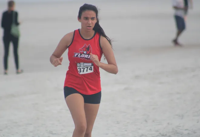 FSDB's Juliana Sevilla (3774) runs in the girls race during the Nor'Eastern Classic high school cross country meet on Sept. 29, 2026 in Jacksonville Beach, Florida. [Clayton Freeman/Florida Times-Union]