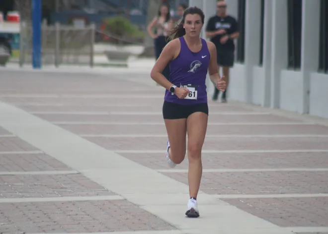 Fletcher's Eliza Hutton (3761) races to the girls victory during the Nor'Eastern Classic high school cross country meet on Sept. 29, 2026 in Jacksonville Beach, Florida. [Clayton Freeman/Florida Times-Union]