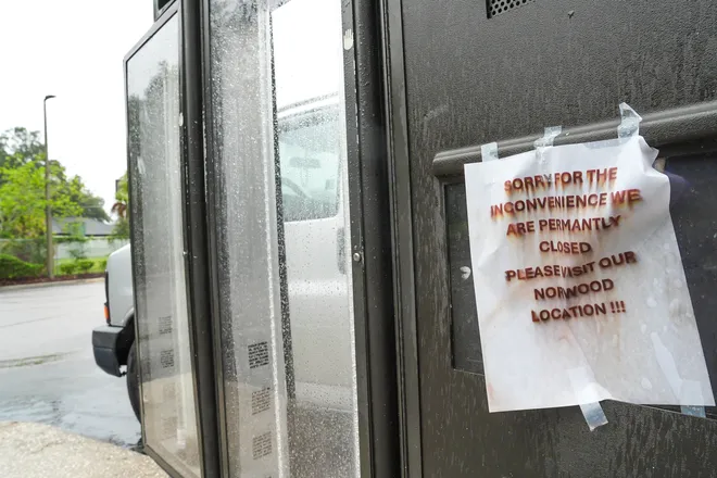 A sign announcing the permanent closure of Wendy's 1175 Dunn Ave. restaurant hangs on the drive-thru menu board on Tuesday October 6, 2026.
