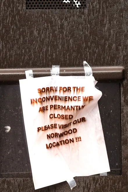 A sign hangs on the former drive-thru menu board at the Wendy's restaurant at 1175 Dunn Ave. in Jacksonville, Florida, Tuesday October 6, 2026. It notifies customers that this location has permanently closed at visit their Norwood location. [Doug Engle/Florida Times-Union]