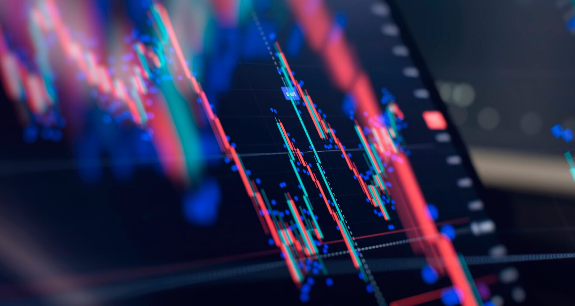 Close-up of a digital stock market trading chart with red and green candlesticks showing price movements.