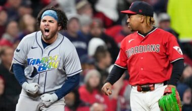 Tampa Bay Rays' Jonathan Aranda celebrates after RBI-single as Cleveland Guardians third baseman José Ramírez looks on during the seventh inning in Game 4 of an American League Championship Series baseball game in Cleveland, Saturday, Oct. 17, 2026. (AP Photo/David J. Phillip)