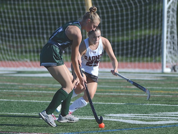 Ridley's Sydney Senkow, left, moves the ball as Radnor's Addie Moak defends in the first half Tuesday. (PETE BANNAN/MediaNews Group)
